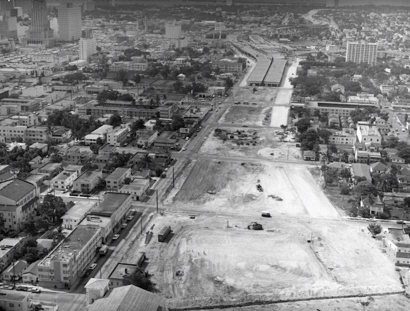 Aerial view of the neighborhood during highway construction